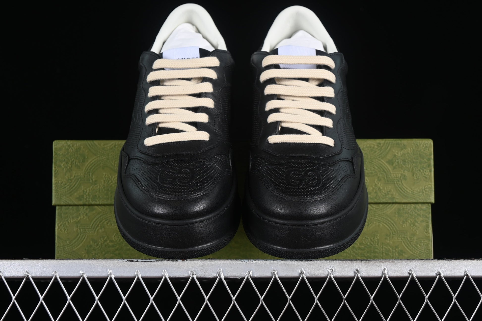 Gucci GG Embossed Leather Sneaker – Black or White XoticBlendz