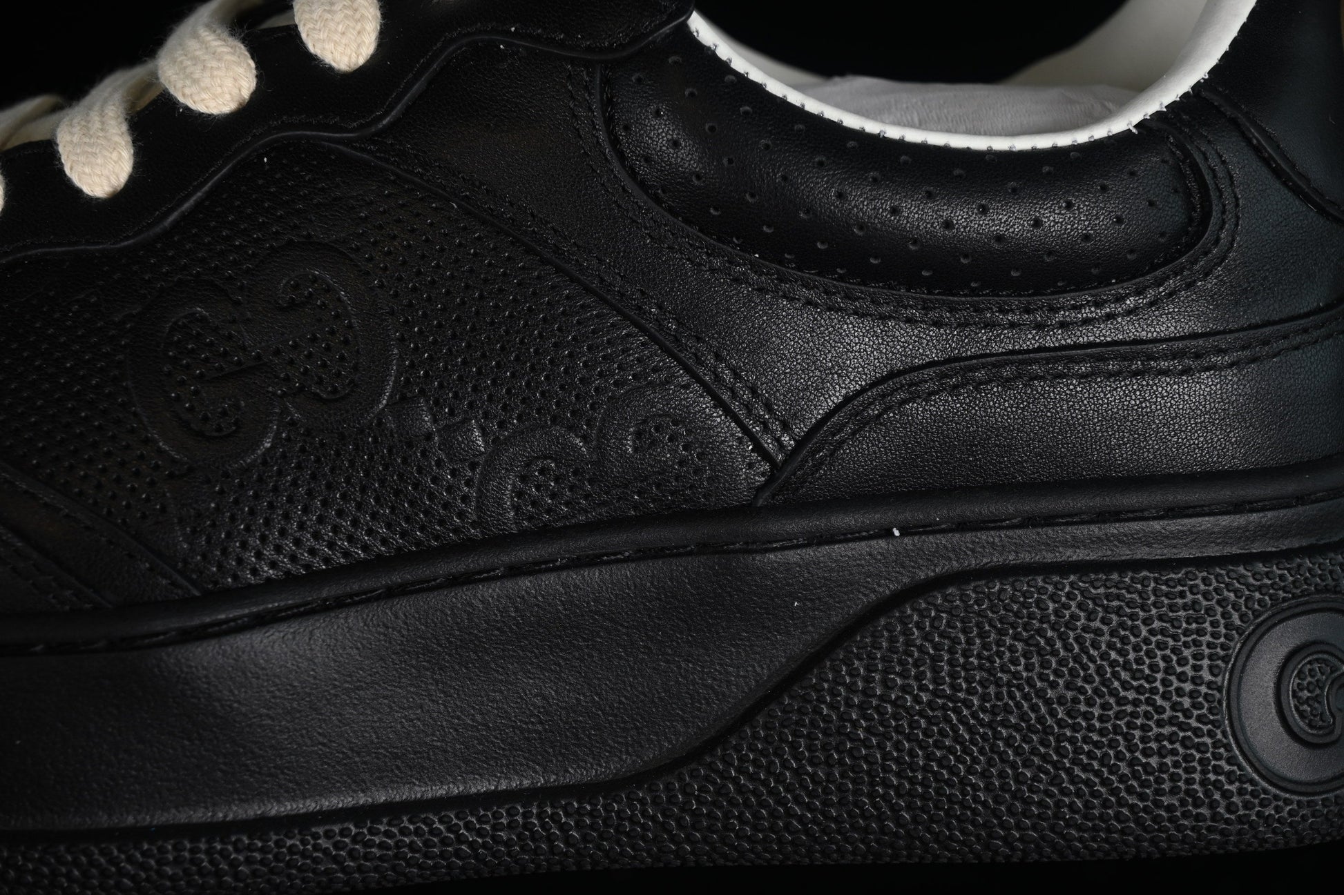 Gucci GG Embossed Leather Sneaker – Black or White XoticBlendz