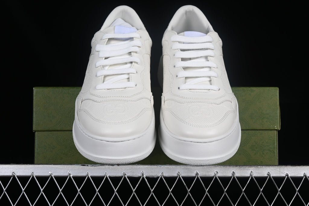 Gucci GG Embossed Leather Sneaker – Black or White XoticBlendz