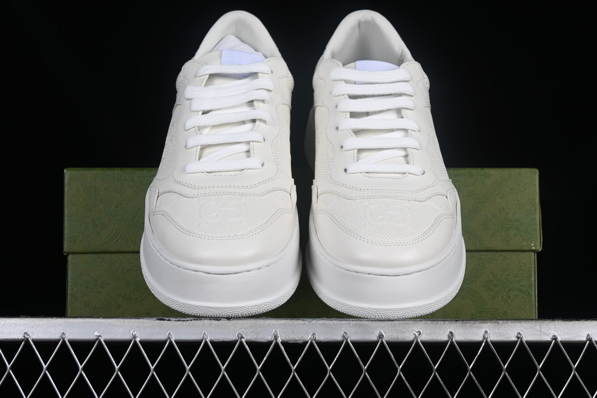 Gucci GG Embossed Leather Sneaker – Black or White XoticBlendz