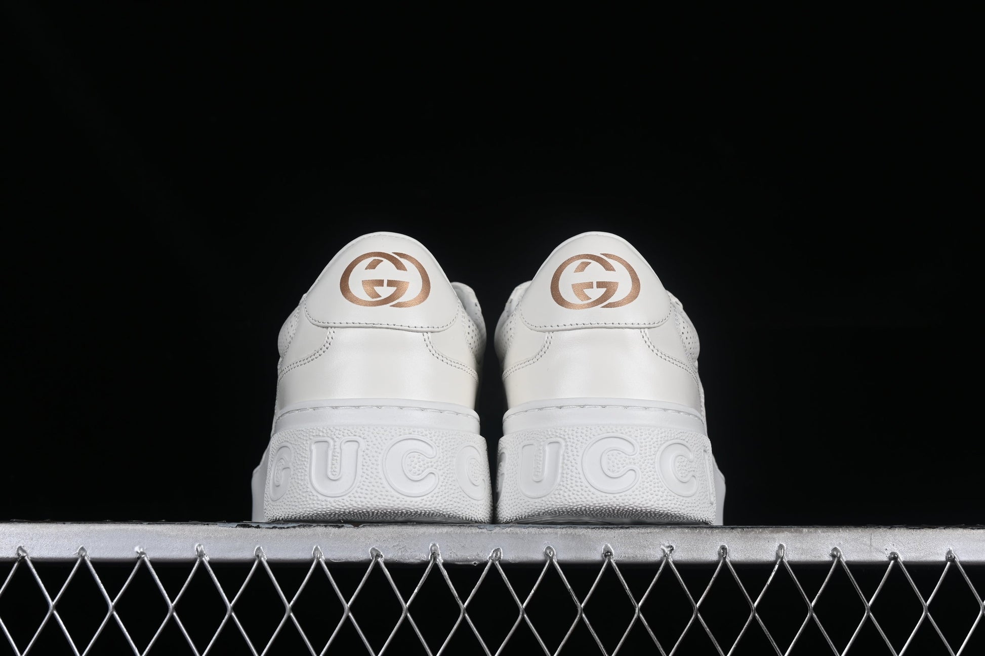 Gucci GG Embossed Leather Sneaker – Black or White XoticBlendz