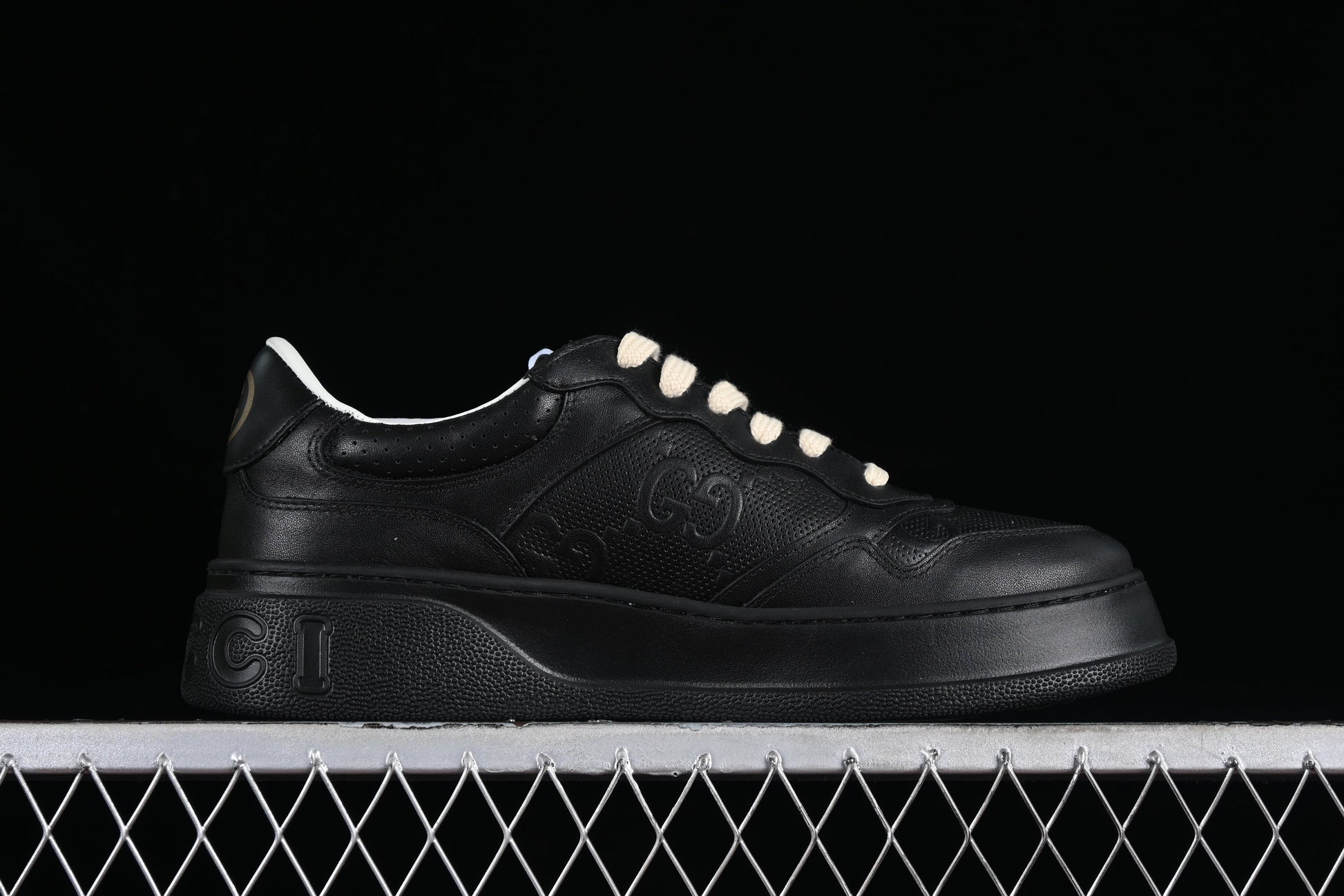 Gucci GG Embossed Leather Sneaker – Black or White XoticBlendz