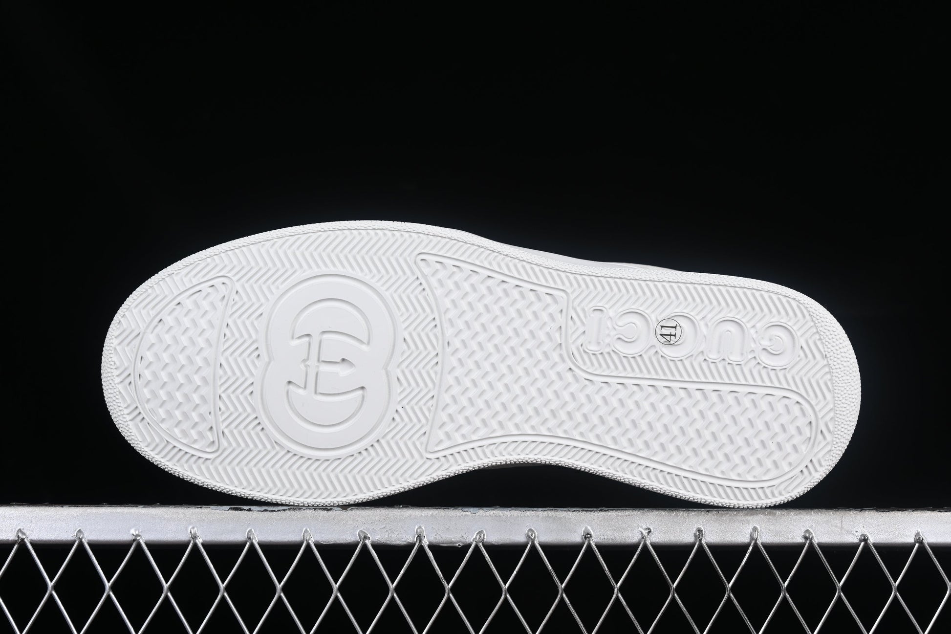 Gucci GG Embossed Leather Sneaker – Black or White XoticBlendz