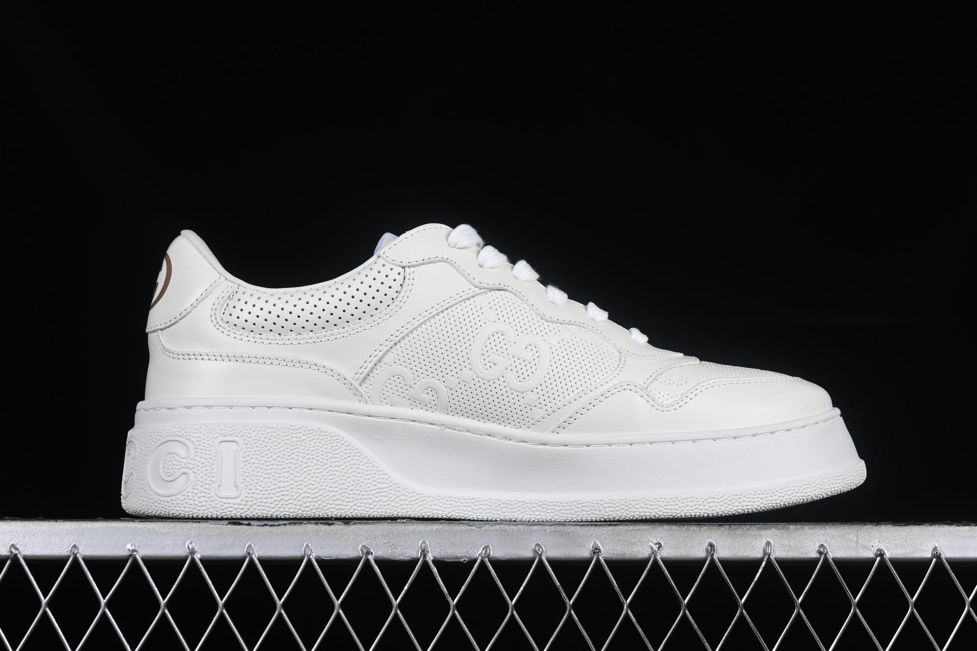 Gucci GG Embossed Leather Sneaker – Black or White XoticBlendz