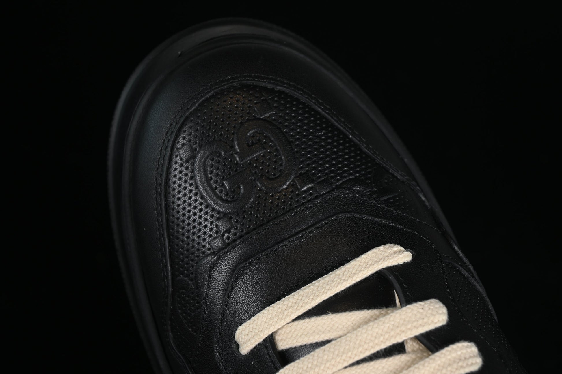 Gucci GG Embossed Leather Sneaker – Black or White XoticBlendz