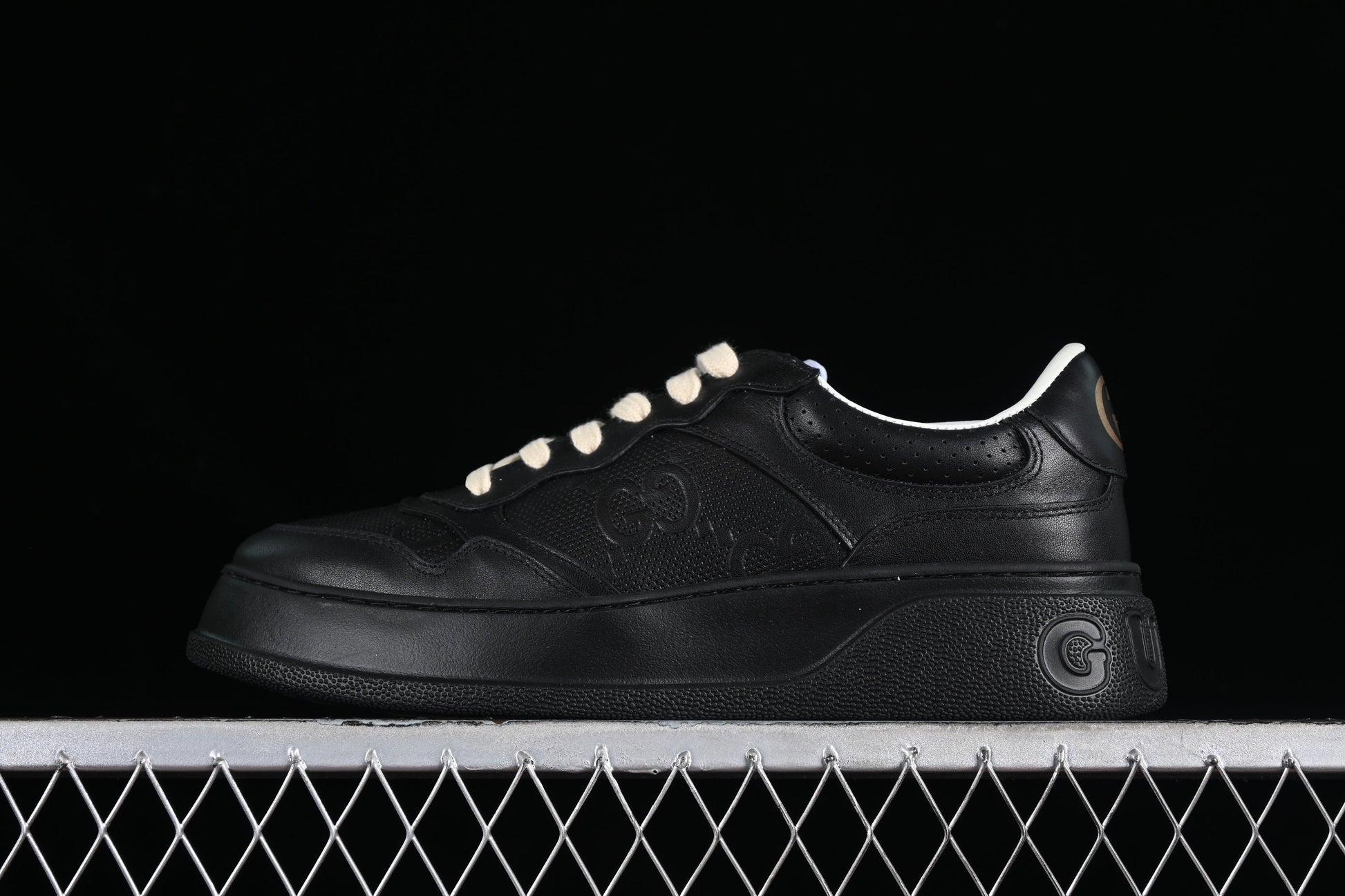 Gucci GG Embossed Leather Sneaker – Black or White XoticBlendz