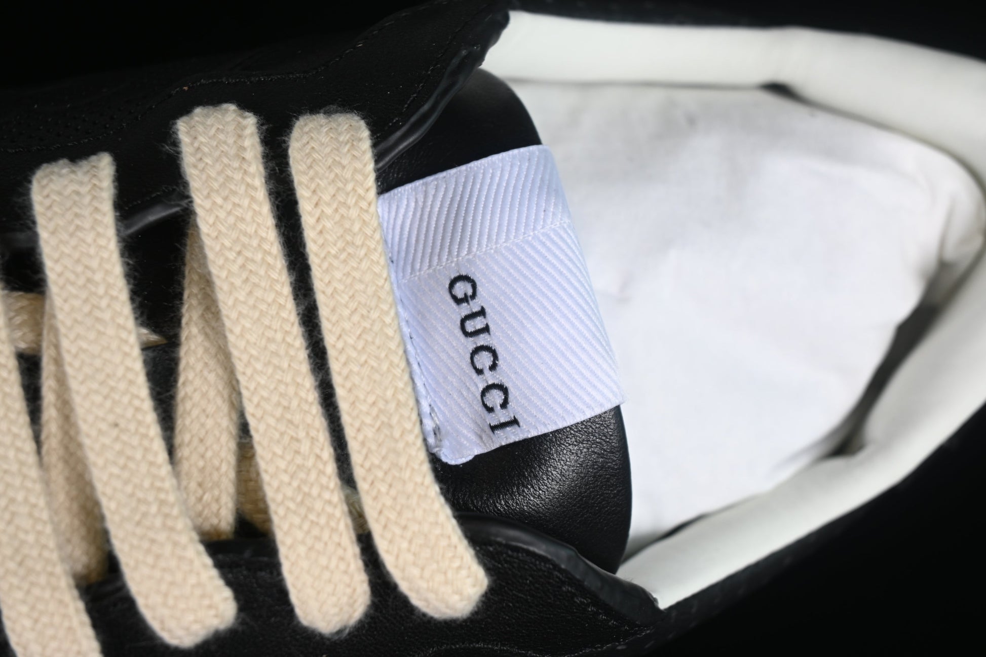 Gucci GG Embossed Leather Sneaker – Black or White XoticBlendz